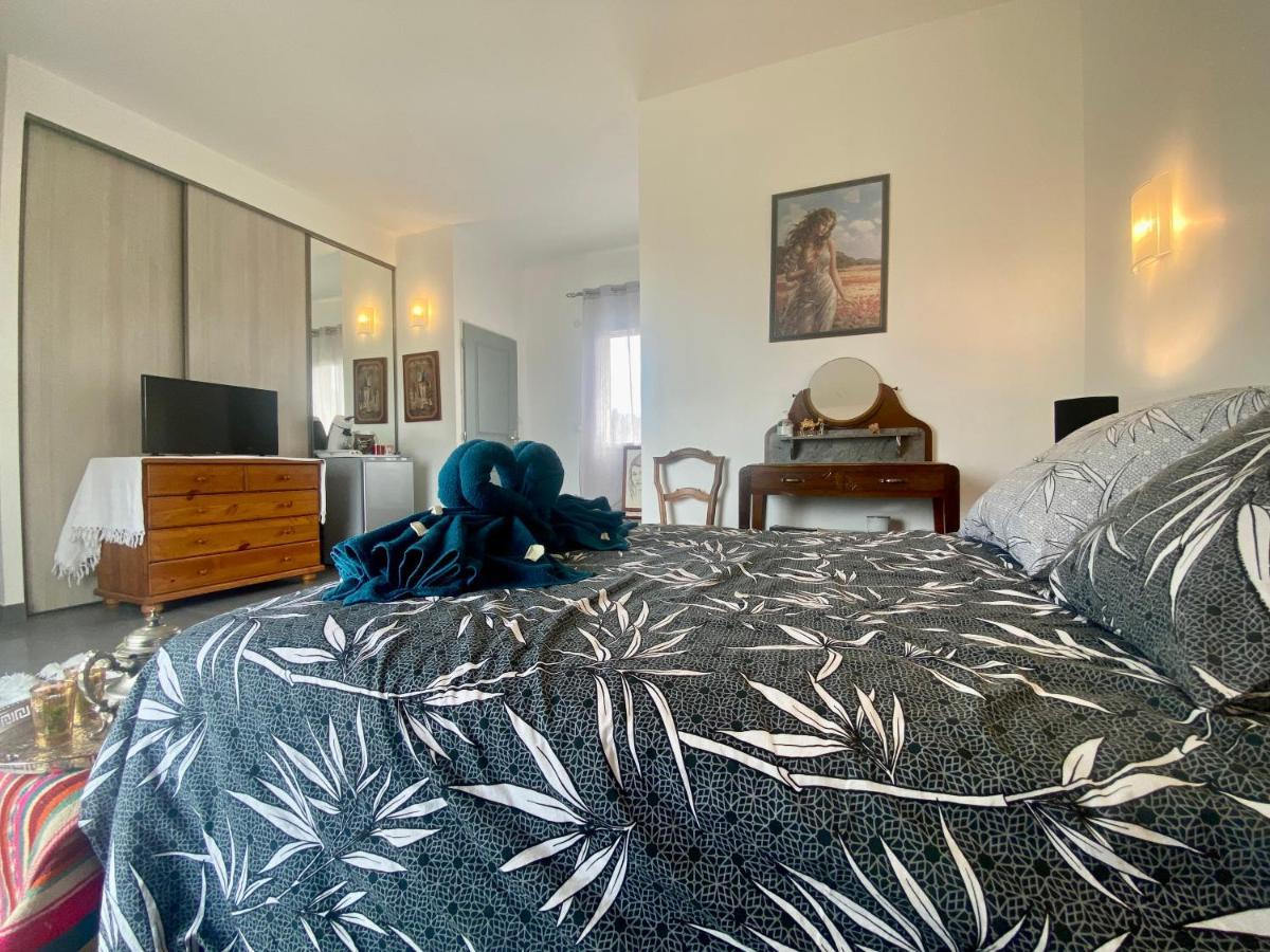 Séjour chez l'habitant Guest-house De L’amandier - Vue Cité Médiévale *